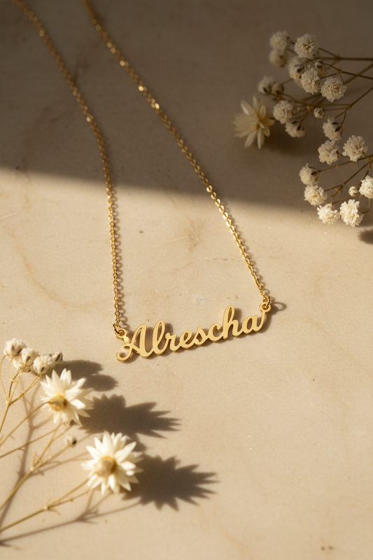 Written in Gold - Alrescha Name Necklace on marble