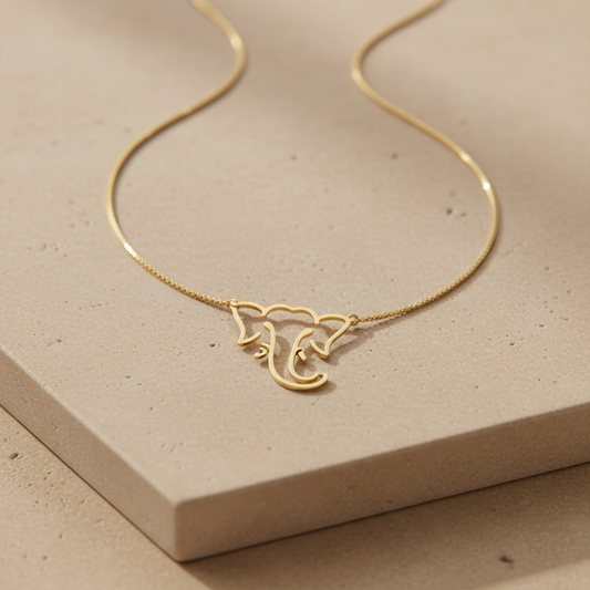 Minimal fine-line Ganpati Bappa gold pendant necklace by Alrescha